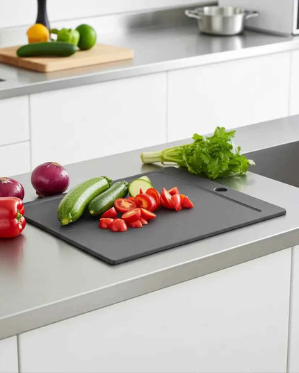 Schwarze Schneidebrett mit Saftlinie – Ihr zuverlässiger Küchenpartner für müheloses Kochen! - NXT Board