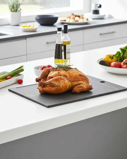 Schwarze Schneidebrett mit Saftlinie – Ihr zuverlässiger Küchenpartner für müheloses Kochen! - NXT Board