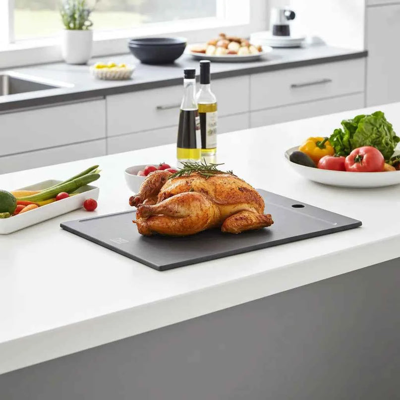 Schwarze Schneidebrett mit Saftlinie – Ihr zuverlässiger Küchenpartner für müheloses Kochen! - NXT Board